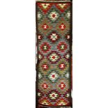 A Maimana Kilim Runner with an all over geometric pattern of diamonds and chevrons 199cm x 63cm