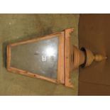 An exterior street lantern post hood of square tapered form with glazed panels and painted to