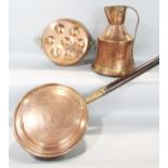 A 19th century copper milk jug with a hammered finish, a copper French escargot pan, and a copper