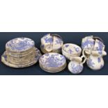 A collection of Royal Worcester Blue Dragon tea wares comprising eight tea cups twelve saucers,