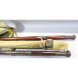 A vintage canvas and leather fishing rod bag containing further vintage rods by Hardy Malloch and