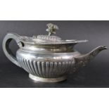 A Goldsmiths & Silversmiths squat silver teapot, London 1926, 12.5oz approx