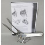 A Stainless Steel German medical instrument for clamping intestine.