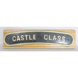 A Castle Class railway plaque with slightly arched outline, 51 cm max, mounted on a later board