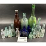 A collection of vintage and antique bottles, including wine, ale, and medicinal examples, (a