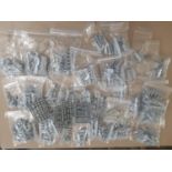Warhammer type game modelling pieces comprising 31 bags of miniature parts for creating armies and