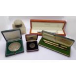A silver mounted onyx inkwell, an Asprey BP forties field medallion from 1970, boxed Clogau pen,