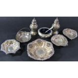 Five silver sweetmeat dishes of various shapes and sizes and a three piece condiment set including