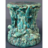 A Bretby ware majolica jardinière stand with marine theme, with shell, weed and other detail, with