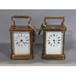 Two french carriage clocks with 8 day movement, enamelled dials each with a key