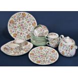 A Mintons Haddon Hall tea set comprising teapot, sugar bowl, milk jug, cups, saucers, tea plates and