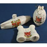 Six crested ware pieces with military significance, to include a tank, an ambulance, an armoured