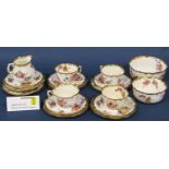 A collection of Hammersley & Co Dresden Sprays comprising eleven tea cups, saucers and tea plates,
