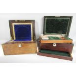 A 19th century walnut writing slope and a 19th century rosewood travelling vanity box, a brass