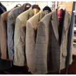 Five Harris tweed jackets, 4 of which have matching waistcoats, sizes 42R x 2, 40R x2 and large