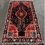 North West Persian Koliahee good quality rug, with a central elongated lozenge medallion on a dark