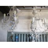 A pair of contemporary light metal three branch chandeliers with decorative painted crazed finish,