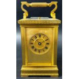 19th century French carriage clock, the brass case with reeded columns, set within dog tooth