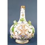 A continental four handled earthenware pilgrim type bottle vase with hand painted blue and green