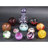 Ten various glass paperweights including Whitefriars, Caithness examples in various designs, an