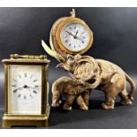 A brass carriage clock with eight day striking movement together with a further mantle clock in