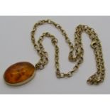 Vintage 9ct amber pendant necklace, the oval cabochon amber 2.5 x 1.8cm approx, 14.3g