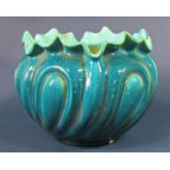 A large Bretby cyan coloured jardinière and three further small decorative bowls