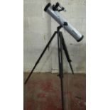 A Bushnell model 78-9003 700mm telescope and stand