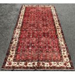 North West Persian Malayer Kelleh in good condition, rug, with an over all floral and geometric