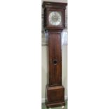 Early 18th century oak longcase clock the trunk with full length door and central lenticle, with