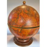 A drinks cabinet in the form of an 18th century Terrestrial Globe with a hinged equator opening to