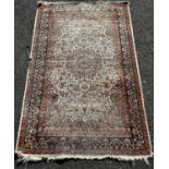 A small silk mat with a floral pattern (as found small holes) 118cm x 74cm, and another silk Persian