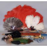 Collection of early 20th century fashion accessories including 2 ostrich feather fans with