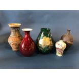 Five vases to include: Chinese sang-de-boeuf yuhuchunping vase with four character mark
