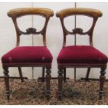 A set of six early Victorian mahogany dining chairs, with carved and moulded frames, the splats with