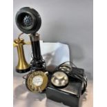 An early 20th century GPO candlestick telephone with brass receiver and dial, incorporating a