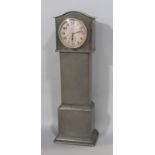 A miniature pewter longcase clock, 33cm tall with eight day time piece, running, together with a