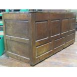 18th century panelled oak coffer with simple plank lid, 140cm