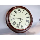 A Stradling circular mahogany wall clock, with key but no pendulum, 39cm diam.