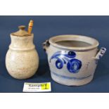 A Berlin stoneware flagon with incised floral detail, further salt glazed oviform jug with loop