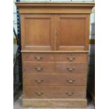 A 19th century pine chest, the lower section enclosed by two long and four short drawers, the