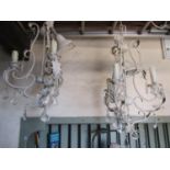 A pair of contemporary light metal three branch chandeliers with decorative painted crazed finish,