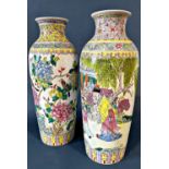 Two large Chinese vases, one decorated with characters in a garden setting with pagoda, the other