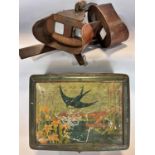 Two 19th century wooden stereoscopes and a collection stereoscopic photographs of varying topics,