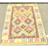 A Chobi Kilim with an all over colourful stepped diamond pattern, 148cm x 102cm approx.