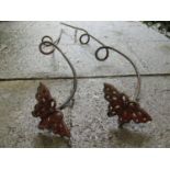 Two contemporary heavy gauge decorative border stakes with floating butterfly finials, 160cm high