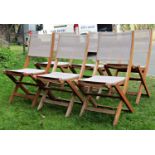 A set of six contemporary weathered teak folding garden chairs with woven seats and backs