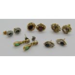 Five pairs of 9ct gem set earrings to include a pair of emerald and diamond drops, 9.7g total