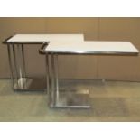 A pair of contemporary chrome cantilever tables with detachable tops