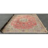 A large Middle Eastern machine made seamless Wilton all wool W G & Co Kidderminster carpet